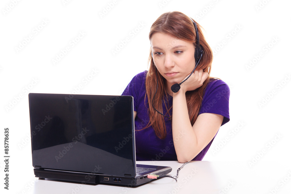 Pretty girl works at the computer Pretty girl works at the computer