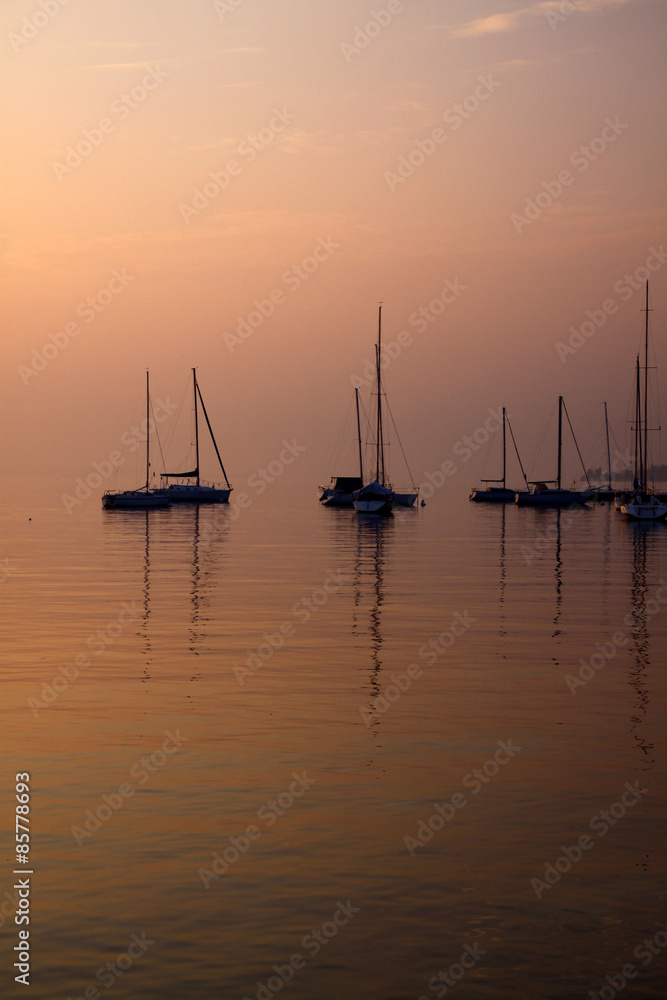 Lake sunset with boats