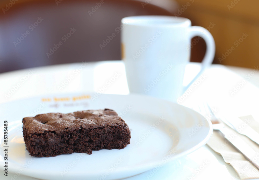 Chocolate brownie with coffee, selective focus