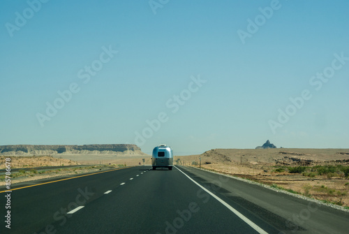 Lonely Caravon driving along the Highway