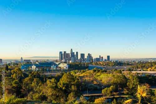 View of Downtown Los Angeles from Elysian Park with the stadium in the foreground © ericurquhart