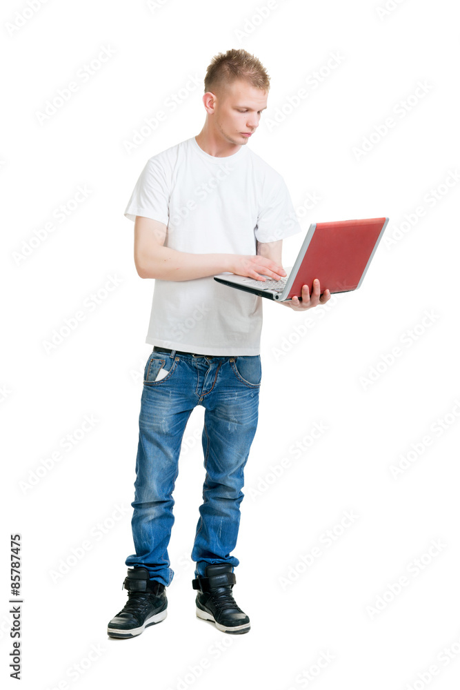 Pupil holding a notebook computer isolated on white