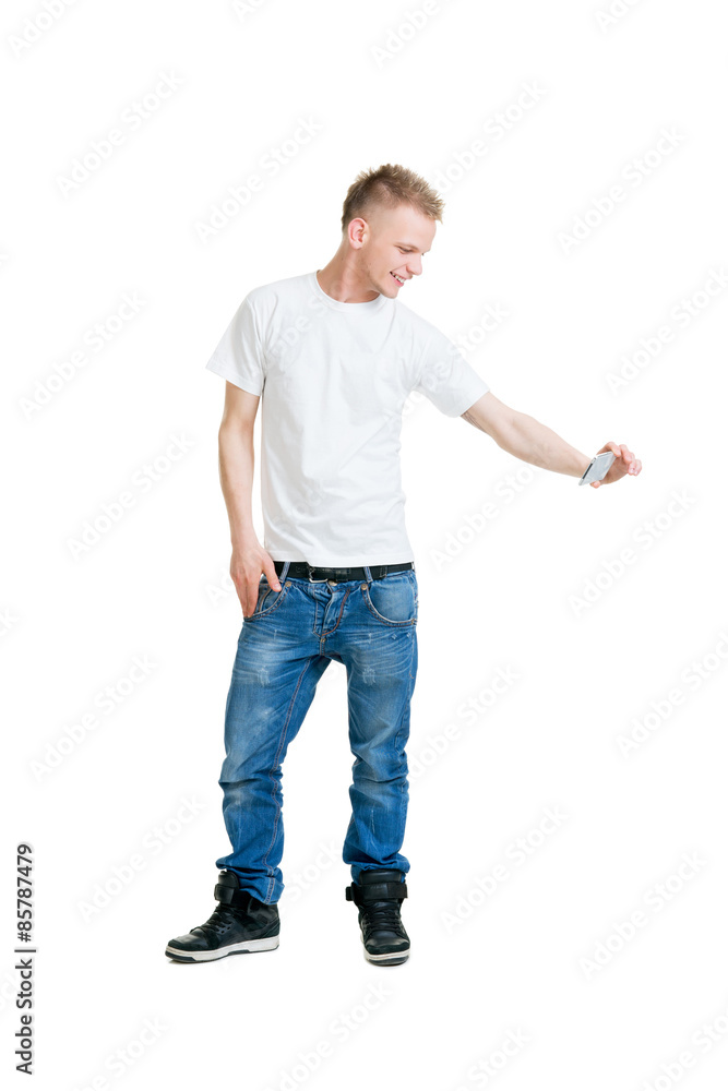 Teenage boy making a selfie isolated on white Teenage boy making a selfie isolated on white