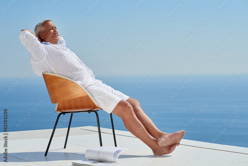 senior man sitting outside
