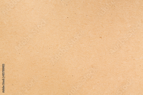 Brown paper background.