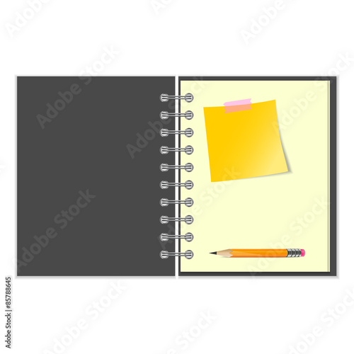 Open notebook with yellow sticker and pencil