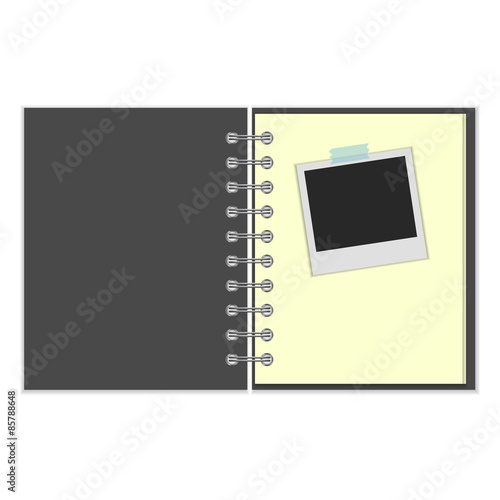 Open notebook with photo