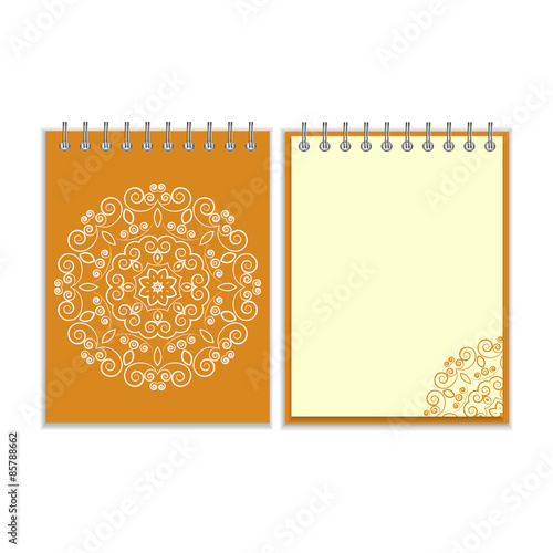 Orange cover notebook with round floral pattern
