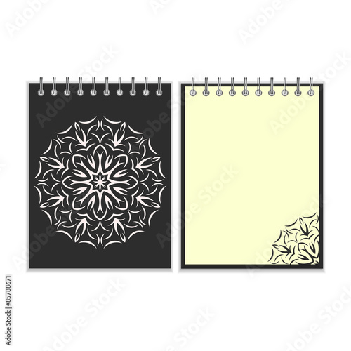 Black cover notebook with round florwer pattern