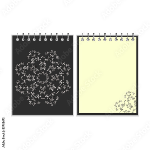 Black cover notebook with round ornate star pattern