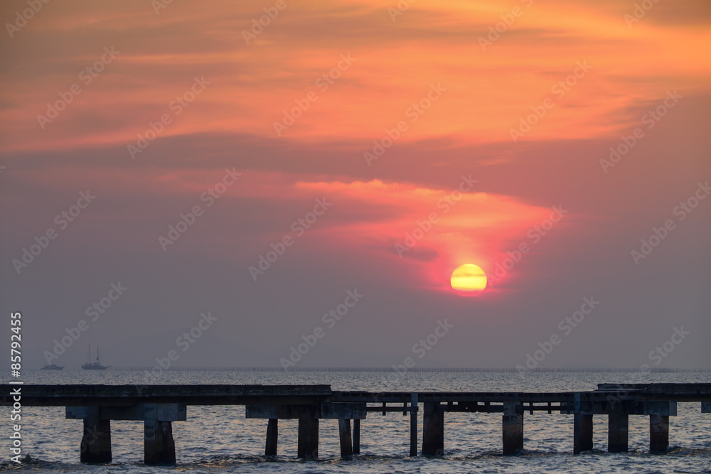 bridge to the sea with Sunset background