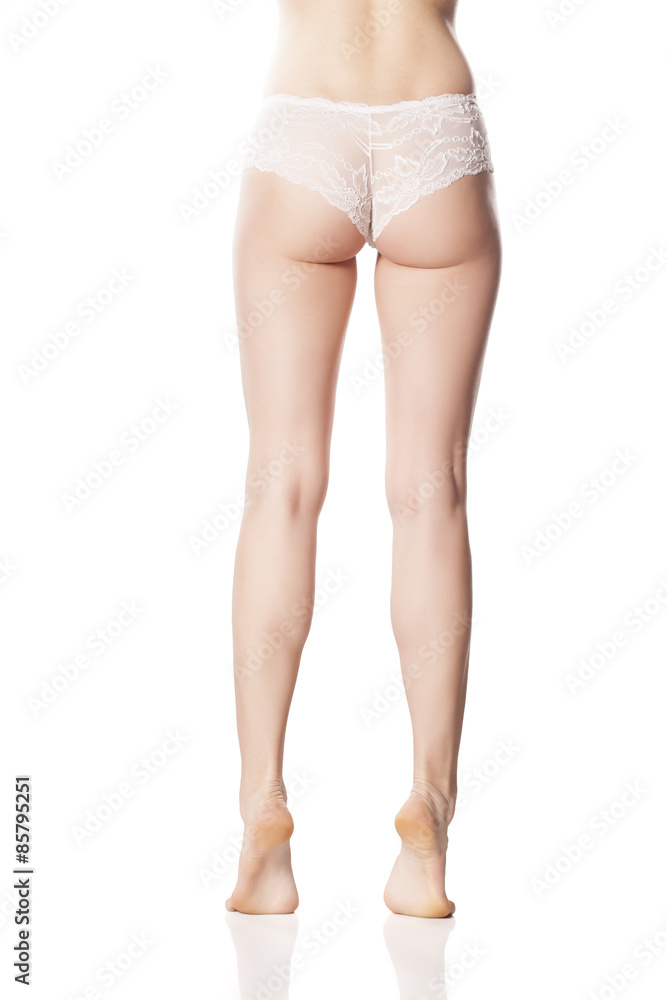 back view of pretty female legs and buttocks in lace panties back view of pretty female legs and buttocks in lace panties