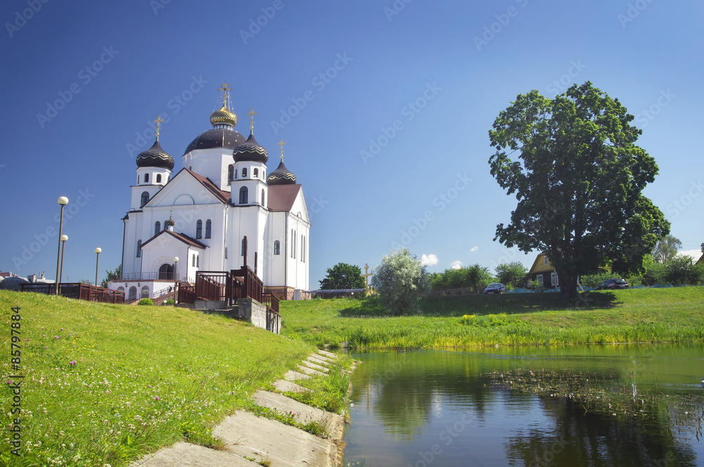 Naklejka premium Orthodox Transfiguration Cathedral on the shore of Oksna river i
