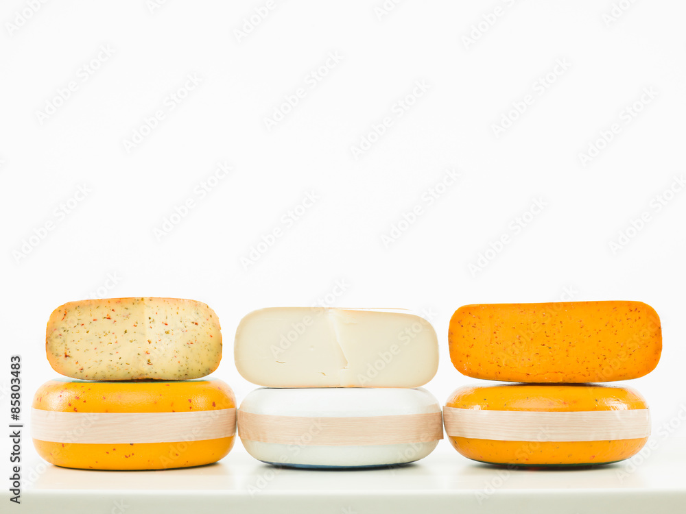 three kinds of cheese arranged in line three kinds of cheese arranged in line