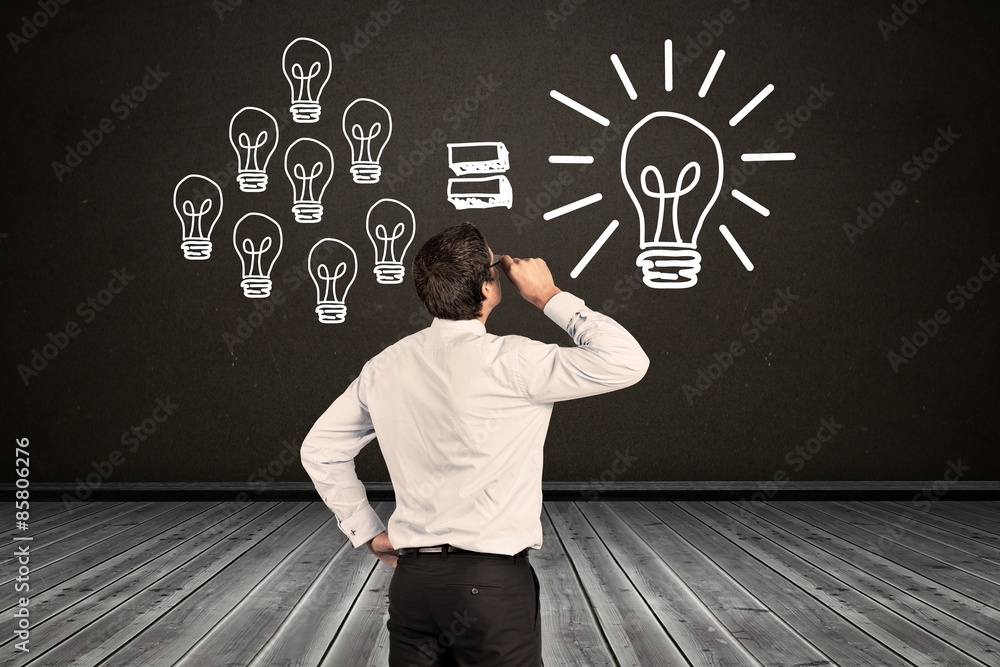 Composite image of thinking businessman tilting glasses Composite image of thinking businessman tilting glasses