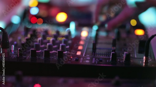 Close-up video of Dj mixing at the night club.