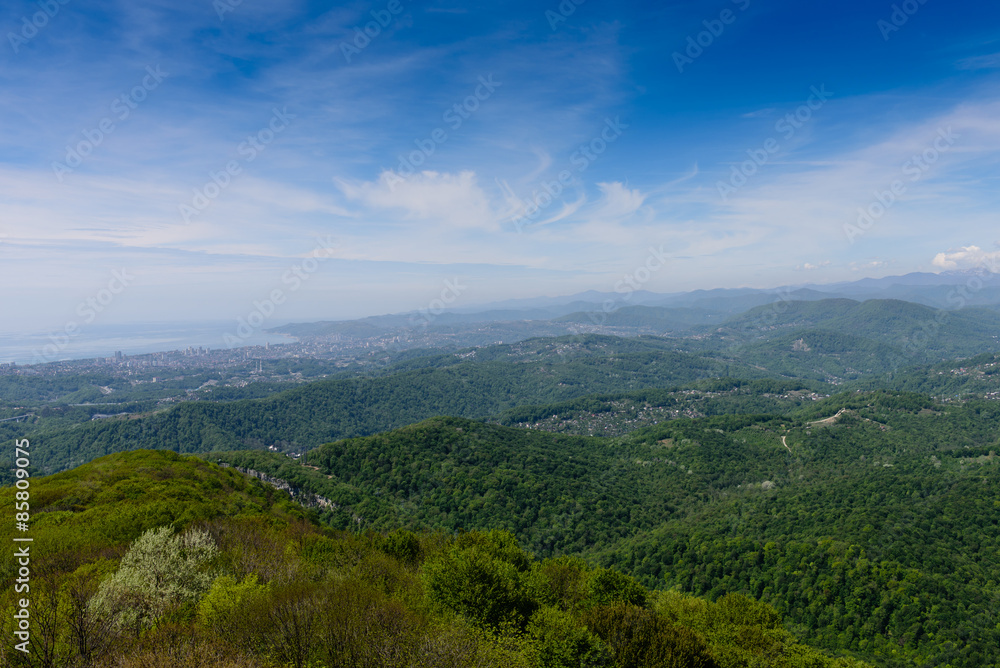 View of Sochi, mountains and the Black sea from the lookout tower on mount Akhun, Sochi, Russia.