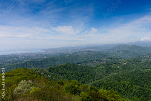 View of Sochi, mountains and the Black sea from the lookout tower on mount Akhun, Sochi, Russia. © r_andrei