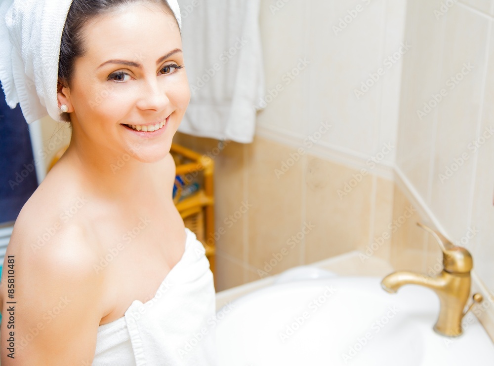 Smiling lady in bathrobe Smiling lady in bathrobe