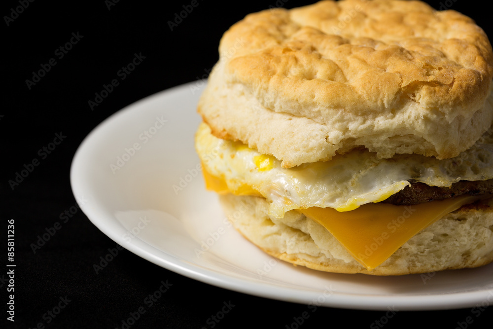 Breakfast sausage egg and cheese biscuit close view Breakfast sausage egg and cheese biscuit close view