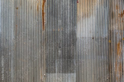 A rusty corrugated iron metal texture. photo