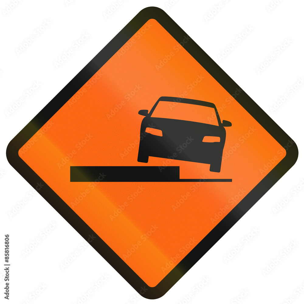 Temporary warning road sign in Indonesia: Uneven road Temporary warning road sign in Indonesia: Uneven road