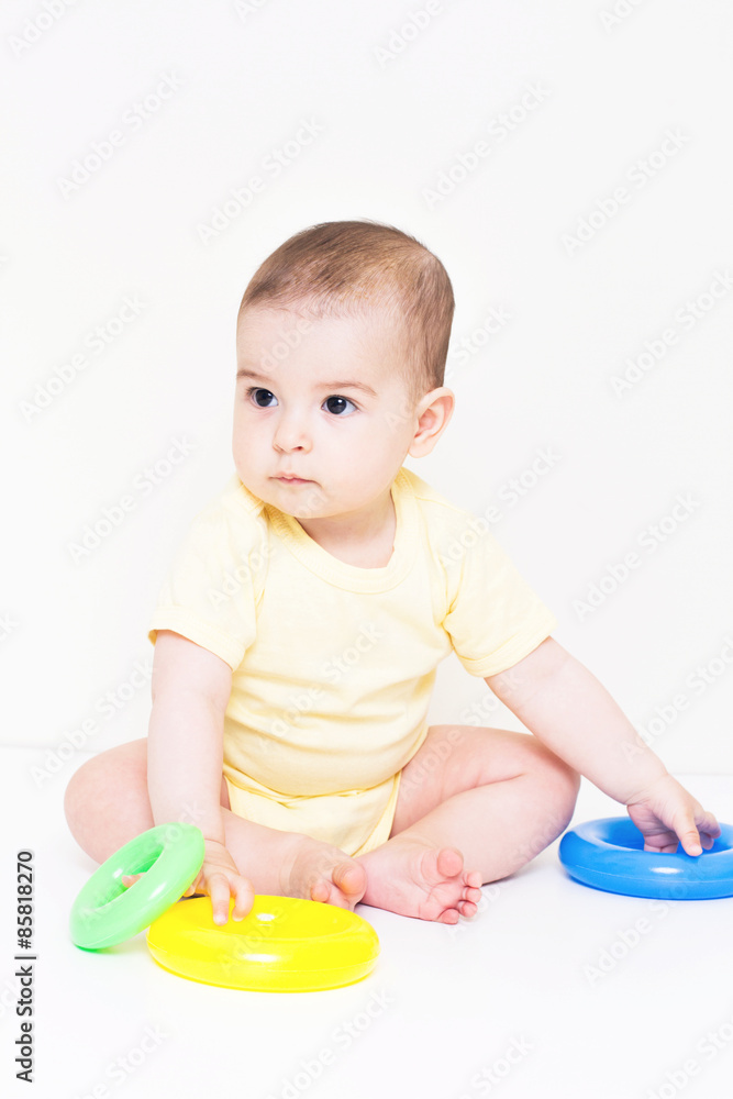 Beautiful baby playing with colorful toy
Beautiful baby playing with colorful toy