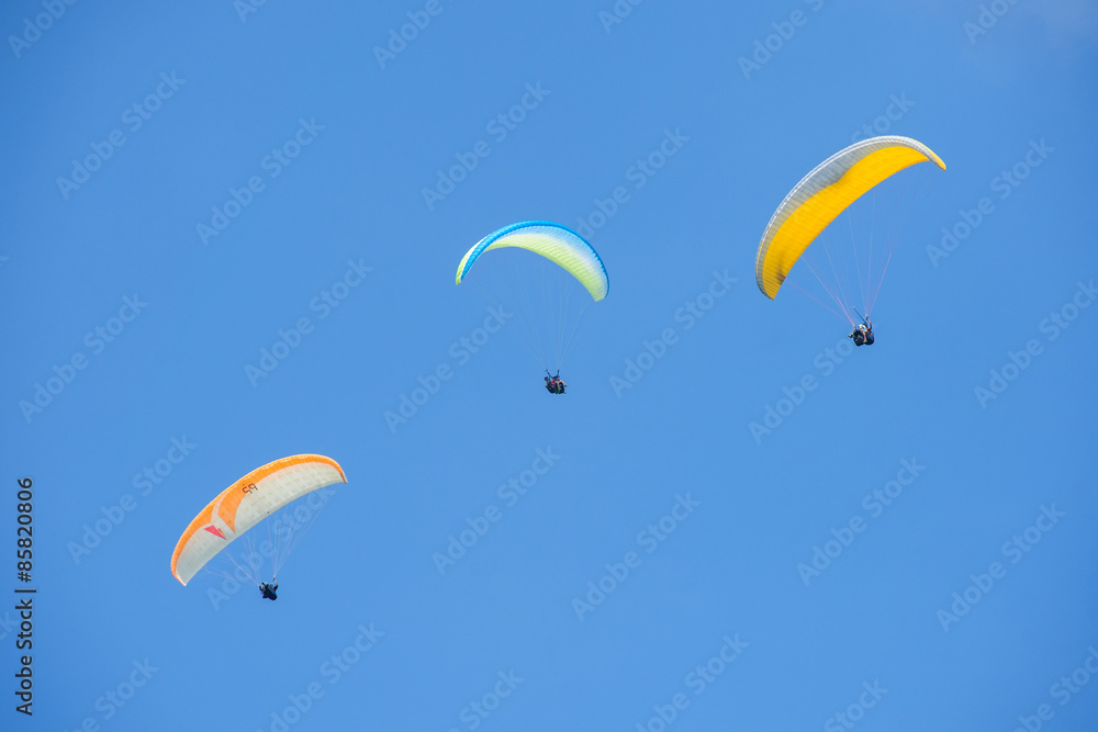Paragliding in blue sky Paragliding in blue sky