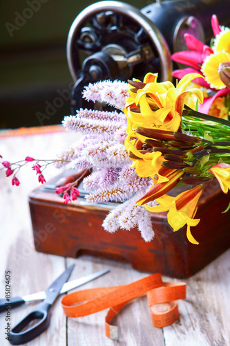 Flowers with old sewing-machine