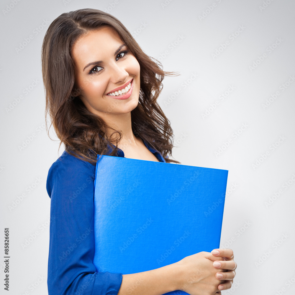 happy smiling businesswoman with blue folder with copyspace, on happy smiling businesswoman with blue folder with copyspace, on