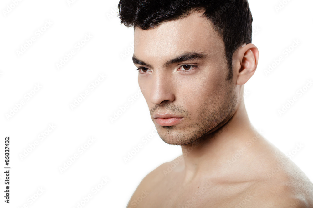 Obraz premium Charming and handsome man face over a white background