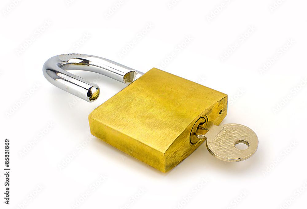 Unlocked padlock with the key on white background Unlocked padlock with the key on white background