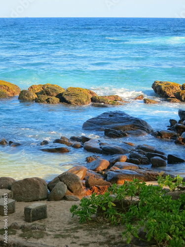 Waves and rocks at ocean bay in Sri-Lanka
