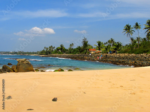 Fototapeta Naklejka Na Ścianę i Meble -  Calm beach with palm trees and sand, Sri-Lanka