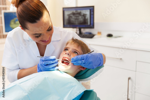 boy visits the dentist for a check up