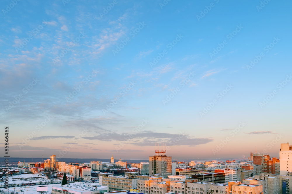 Panoramic views of city on background beautiful blue sky 