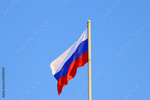 Evolving in wind flag of Russian Federation on bright sunny day