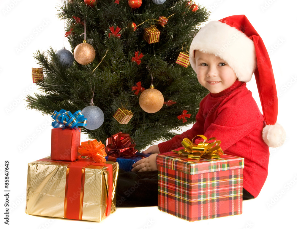 Boy by the christmas tree Boy by the christmas tree