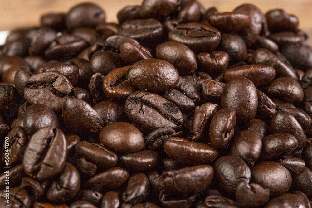 Coffee bean on grunge wooden background Coffee bean on grunge wooden background