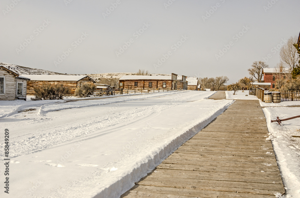 Deserted Main Street in a ghost town in winter