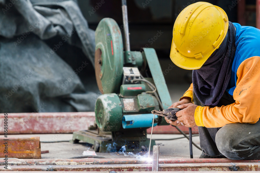 Steel Workers welding, grinding, cutting in metal industry Steel Workers welding, grinding, cutting in metal industry