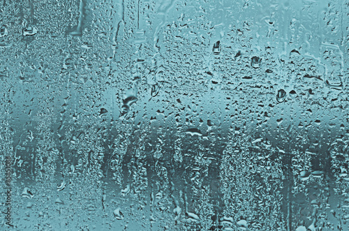 natural water drops on glass window
