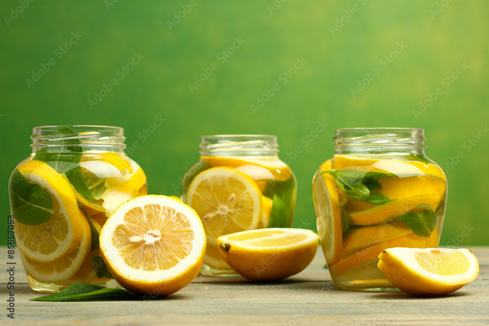 lemonade and glass on a wooden background lemonade and glass on a wooden background
