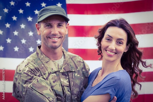 Handsome soldier reunited with partne photo