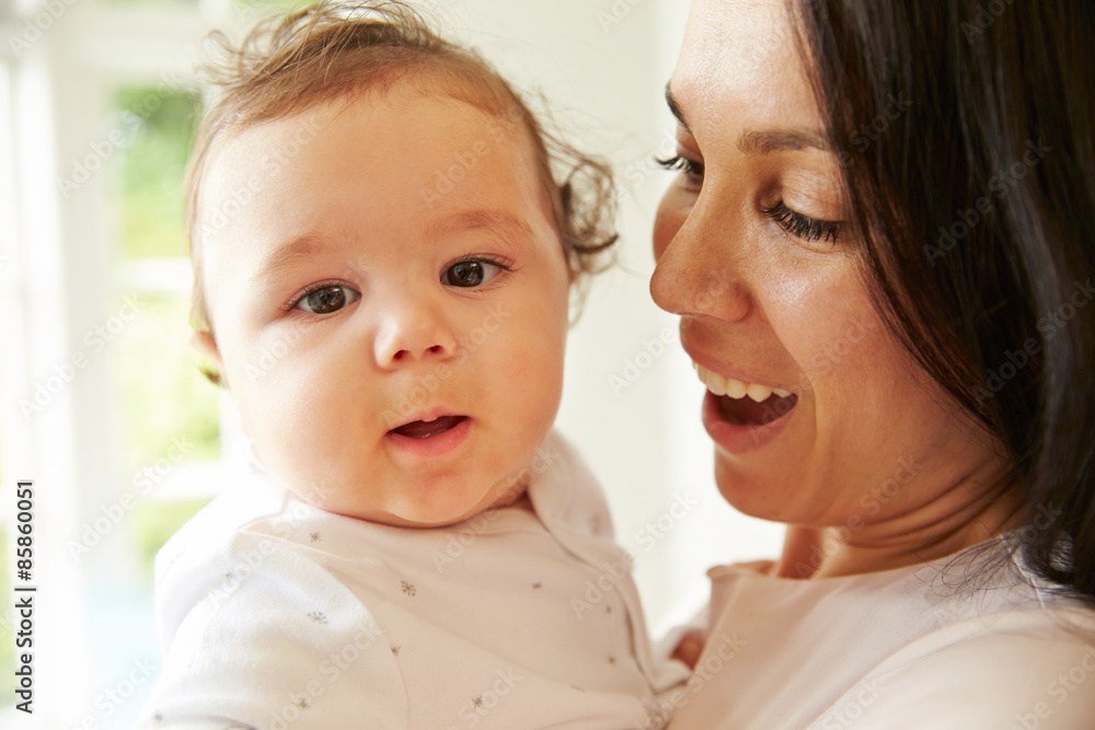 Mother Cuddling Happy Baby Boy At Home Mother Cuddling Happy Baby Boy At Home