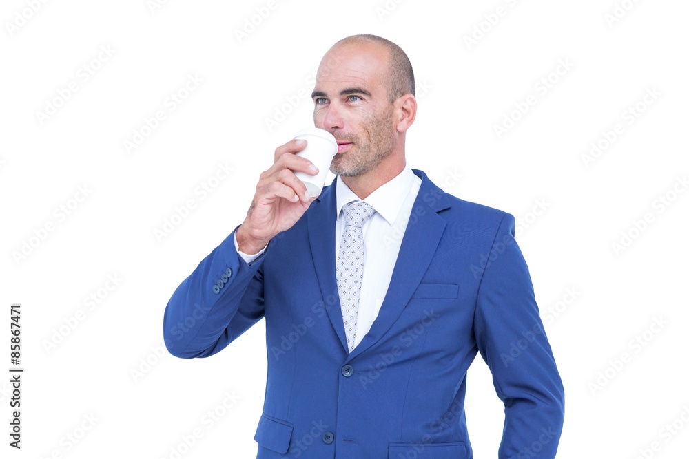 Happy businessman drinking cup of coffee Happy businessman drinking cup of coffee