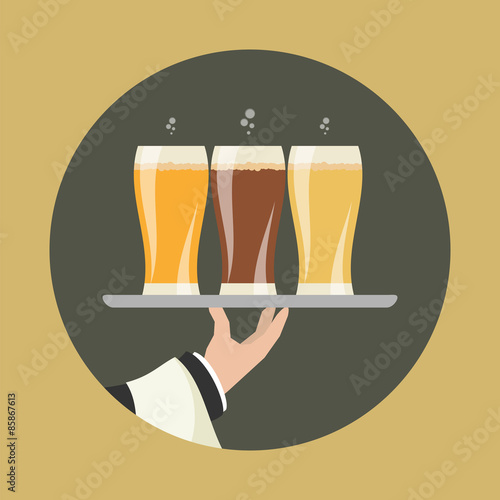 Waiter with three glasses of beer