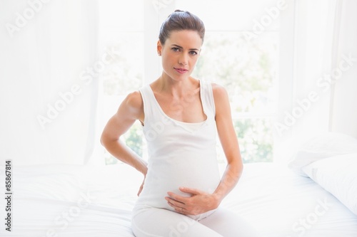 Pregnancy sitting on the bed Free Download Pregnancy sitting on the bed - GFXLoad