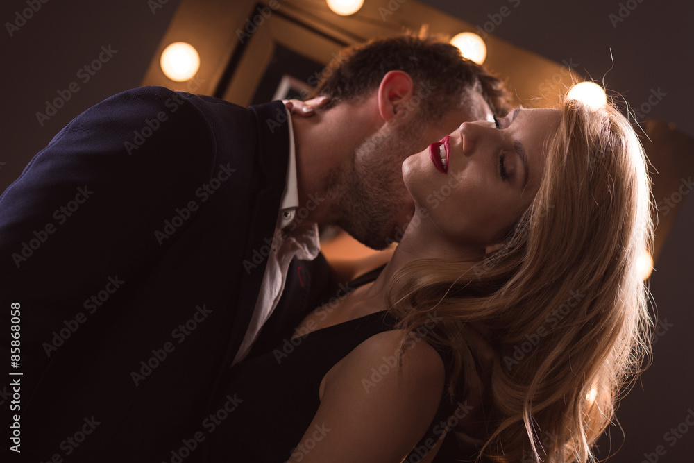 Lover kissing neck of woman Lover kissing neck of woman