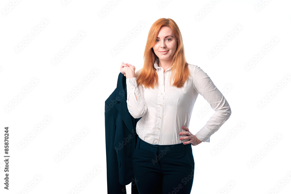 Red-haired businesswoman with a jacket in his hands Red-haired businesswoman with a jacket in his hands
